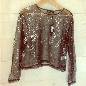 Black sheer top with silver glitter stars